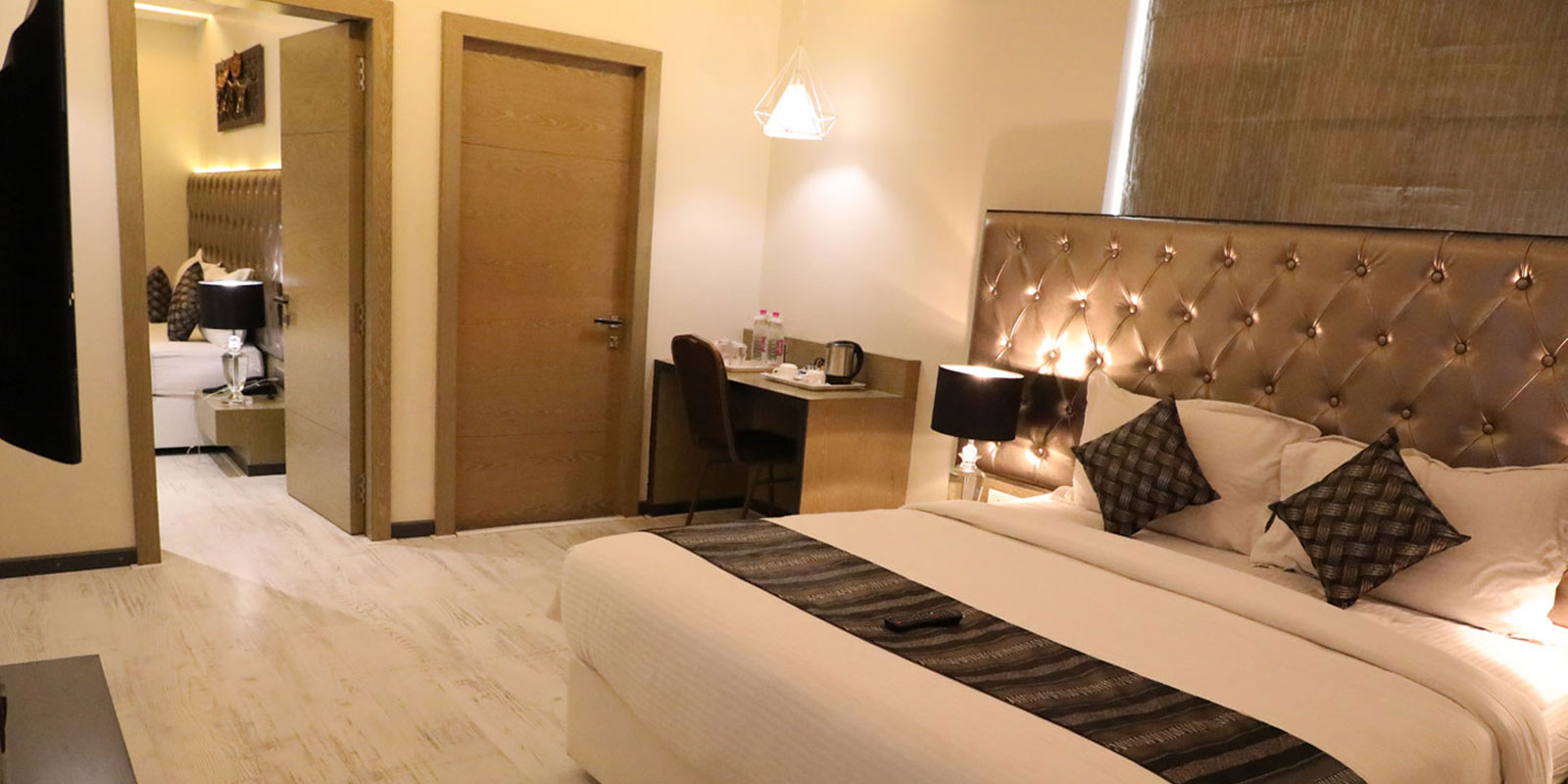 https://staging.hotelimperialgrand.com/wp-content/uploads/2024/07/family-suite-room-wrapper.jpg